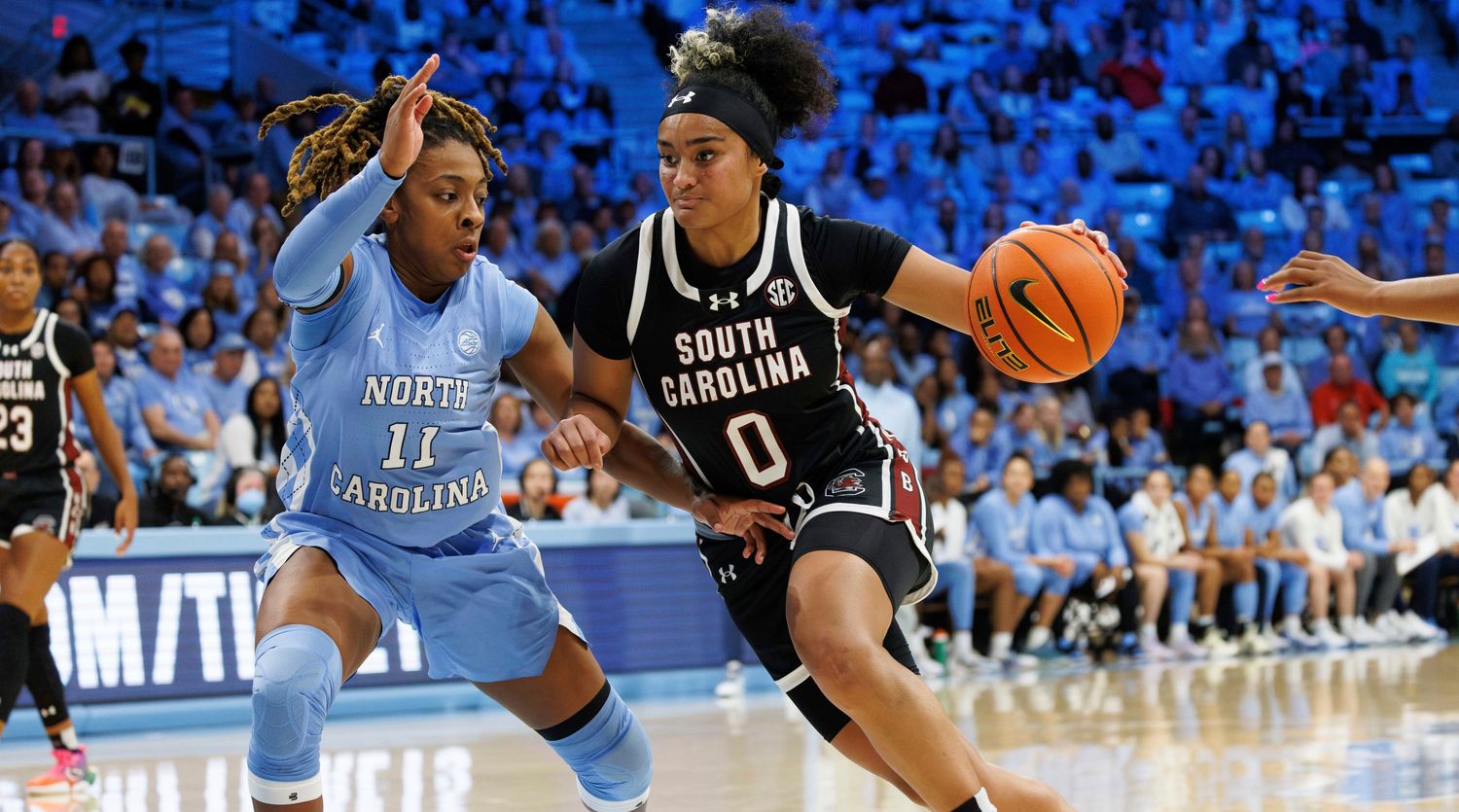 South Carolina’s Te-Hina Paopao (0) drives against North Carolina's Kayla McPherson (11) during the second half of a game.